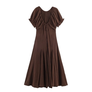 Brown short sleeve V-neck dress with tie details and a flowing A-line silhouette