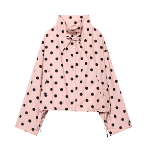 Detail of high collar and drawstring on pink polka dot long sleeve jacket