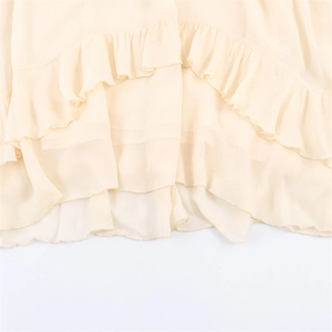 Chic cream layered ruffle dress for women with a soft flowing aesthetic for spring