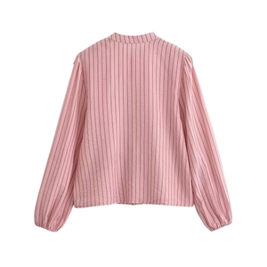 Detail view of pink vertical striped shirt back with standing collar and ruffles