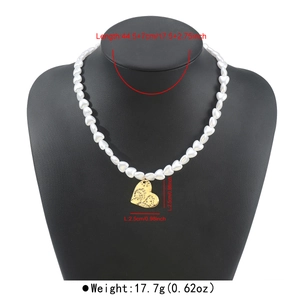 Vintage heart pearl necklace detail showing size and weight measurements in inches and cm