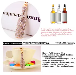 Macro detail of wine bottle keychain with sparkling crystals and zinc alloy finish