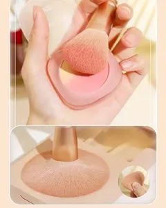 Detail of high-density soft synthetic bristles and gradient blush in a portable compact