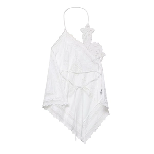 Detail of white bohemian halter top featuring intricate floral lace and embroidery texture