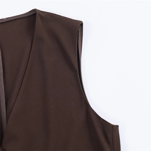 Detail of the mocha brown sleeveless top showing reinforced seams and neck binding