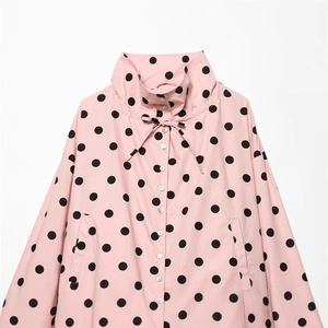 Relaxed pink polka dot long sleeve jacket with high drawstring neck and front buttons
