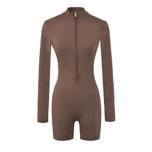 Detail view of brown slim fit long sleeve bodysuit with half-zipper stand collar and smooth texture