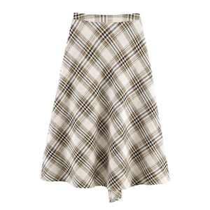 Macro detail of high-waisted A-line plaid midi skirt with classic tartan pattern