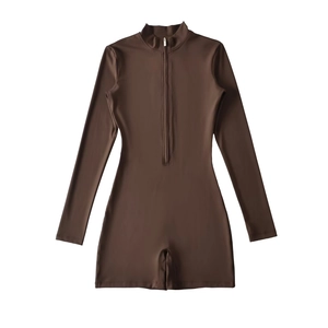 Detail of a chocolate brown slim fit long sleeve bodysuit with a front zipper closure