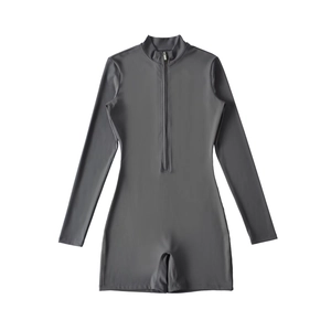 Detailed view of the dark grey athletic bodysuit featuring a sturdy front zipper and stand collar