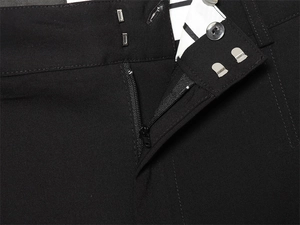 Detailed view of black trousers showing double metal hook and button waist closure