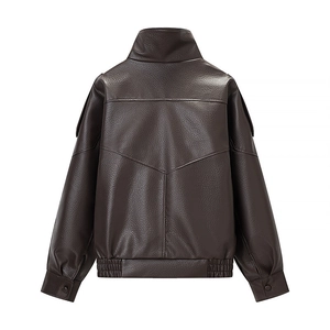 Rear view of brown faux leather jacket with geometric back stitching and ribbed cuffs