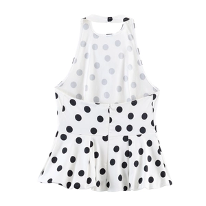 Detailed back view of a white halter neck polka dot top with invisible zipper and pleats