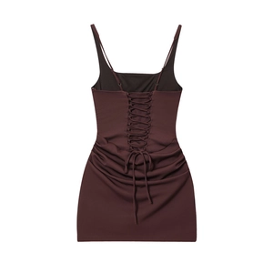 Detailed back view showing criss-cross lace-up design on a dark red sleeveless dress