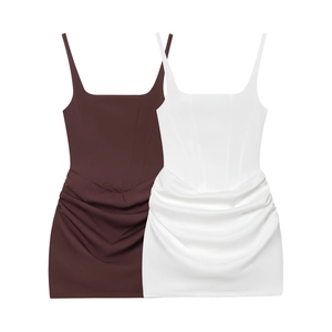 Women's corset style mini dress with spaghetti straps and pleated ruched details in brown and white