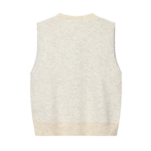Close-up of beige knitted vest with subtle sequins and ribbed crew neck details