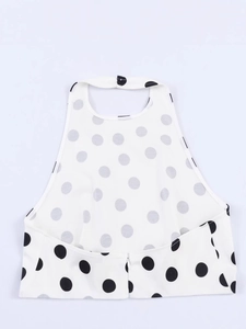 Women's summer retro halter crop top featuring black polka dots and back zipper detail