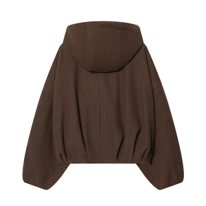 Detailed back view of a dark brown hooded jacket with dropped shoulders and gathered hem