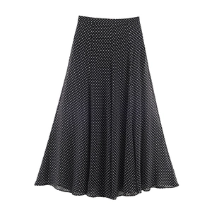 Elegant high-waisted black and white polka dot A-line maxi skirt with draped silhouette