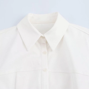 Classic white button-down shirt with turn-down collar and twill texture for women