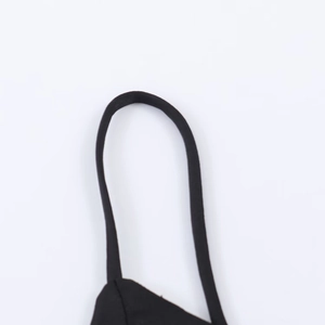 Close-up detail of the adjustable black thin shoulder strap on a satin camisole top