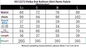 Detailed size chart for polka dot skort including waist and length measurements in centimeters