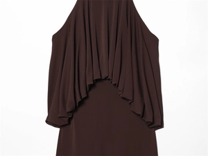 Detail of elegant coffee brown dress showing sophisticated draped fabric and silky texture