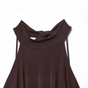 Slim fit dark coffee halter dress with unique knot detail and smooth draped fabric