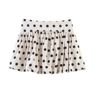 High-waist ivory white mini skirt with black polka dots and pleated balloon hem