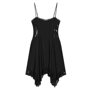 Detail of black lace trim and asymmetrical hem on a stylish slip mini dress for women