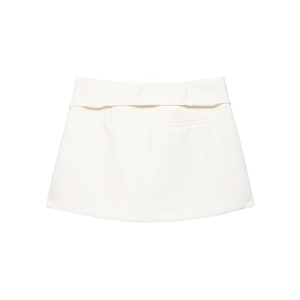 Detail of high-waisted white A-line skirt featuring a matching belt and a decorative pocket