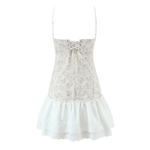 Close-up of lace-up back detail on floral camisole dress with eyelet embroidery