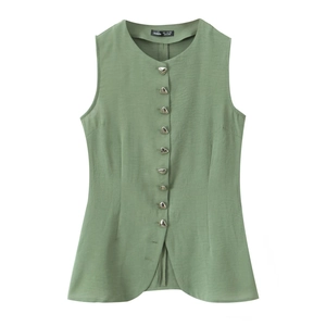 Pale green two-piece set featuring a sleeveless vest with decorative silver triangle buttons