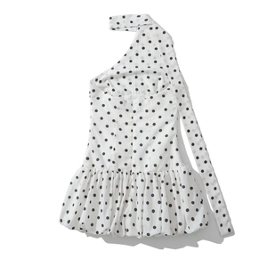 Detail of polka dot halter top showing ruffled hem and side invisible zipper closure