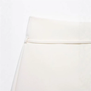 Minimalist white high-waist skirt trousers with belt detail and elegant stitching