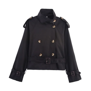 Detailed view of black double-breasted cropped trench coat with waist belt and buckles