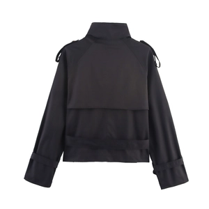 Rear view of black short trench coat showing storm flap, shoulder epaulets and belt cuffs