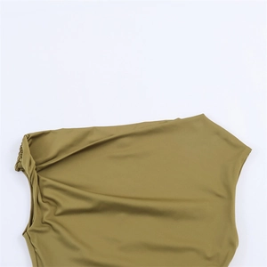 Detail of olive green sleeveless dress featuring a twisted knot and pleated shoulder design