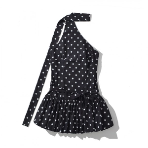 Polka dot halter neck mini dress with waist tie and ruffled hem on white background