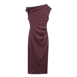 Detail of burgundy one-shoulder midi dress featuring elegant side ruching and pleated fabric