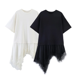 Detail of irregular hem with floral lace patchwork on black and beige cotton t-shirts