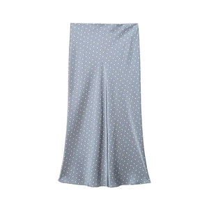 Detail view of light blue polka dot satin midi skirt with elegant silk-like texture