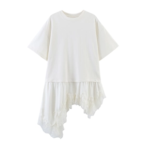 Detailed view of asymmetric hemline featuring delicate white lace and ruffled satin trim