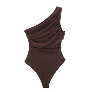 Detail of deep brown one-shoulder bodysuit featuring elegant draped pleats and high elasticity