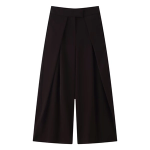 Detail showing the pleated waist and straight wide leg design of the black high-waisted trousers