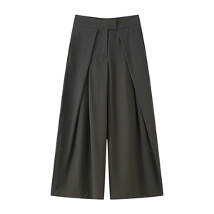 Detail view of dark grey high-waisted wide-leg trousers featuring elegant box pleats