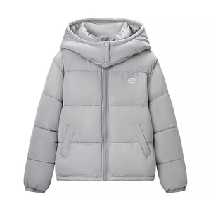 Detail of high collar windproof design and oval logo on light gray hooded puffer jacket