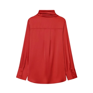 Detailed back view of red satin blouse featuring pleated yoke and elegant buttoned cuffs