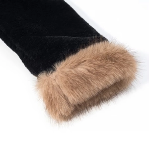 Detail of winter jacket sleeve with thick black fabric and brown faux fur trim