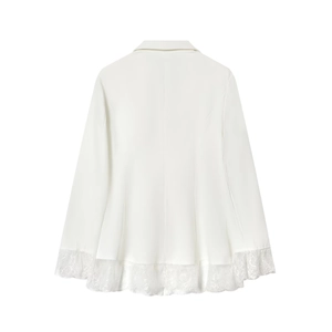 Detail of white blazer back showing elegant lace splicing on cuffs and hemline